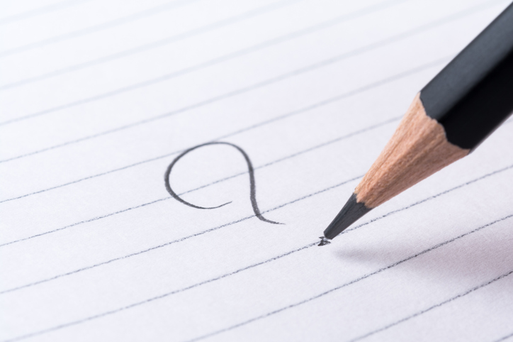 Speechwriting; a pencil draws a question mark