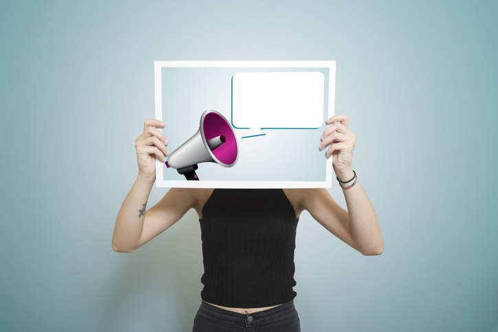 If Facebook stops political_ads If Facebook stops running political ads. Person holding picture of megaphone with text bubble