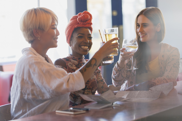 Young women enjoying drinks