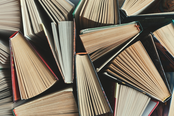 political-direct-mail Books standing up, pages fanned