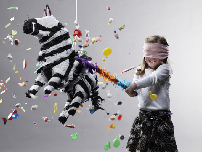 political-campaign-ads Girl hitting a pinata