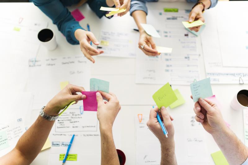 power mapping Picture of hands holding post-it notes power mapping