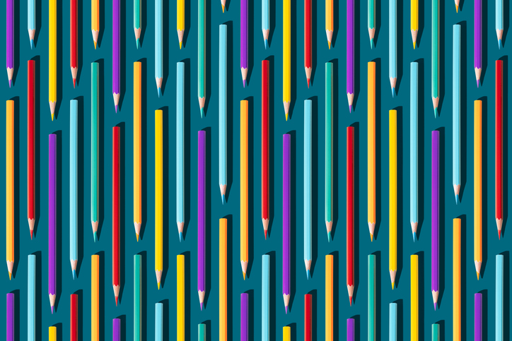 Colored Pencils Colored pencils vertical, on dark turquoise background