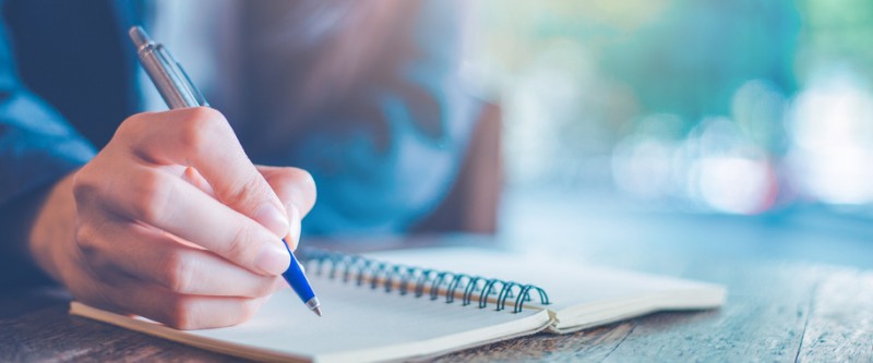 advocacy training person writing in notebook