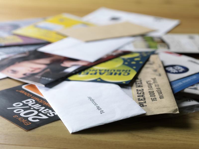 Independent expenditure mail on a wooden table