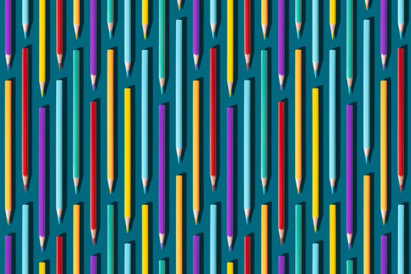 Colored pencils vertical, on dark turquoise background