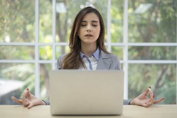 Stressed woman with laptop 