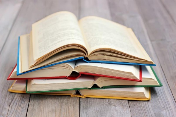 Stack of books opened, Nonprofit Storytelling 