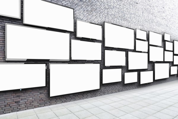 Blank tvs up on a wall 